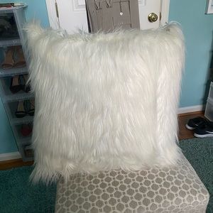 2 off white pillows.